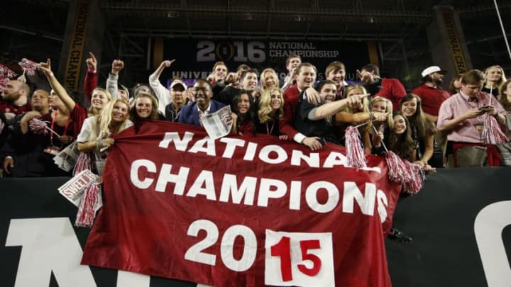 GLENDALE, AZ - JANUARY 11: Alabama Crimson Tide fans celebrate after defeating the Clemson Tigers in the 2016 College Football Playoff National Championship Game at University of Phoenix Stadium on January 11, 2016 in Glendale, Arizona. The Crimson Tide defeated the Tigers with a score of 45 to 40. (Photo by Christian Petersen/Getty Images)