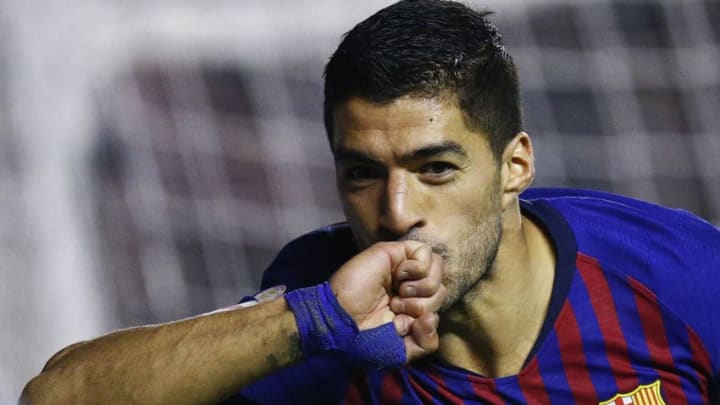 Barcelona's Uruguayan forward Luis Suarez celebrates after scoring a goal during the Spanish league football match between Rayo Vallecano de Madrid and FC Barcelona at the Vallecas stadium in Madrid on November 3, 2018. (Photo by BENJAMIN CREMEL / AFP) (Photo credit should read BENJAMIN CREMEL/AFP/Getty Images)