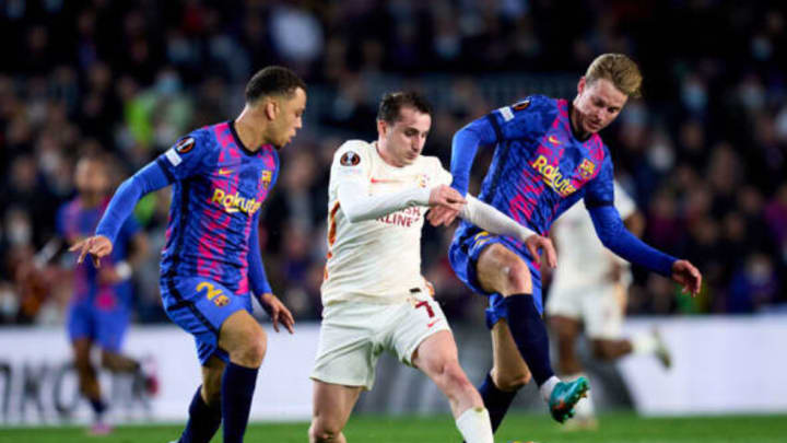 Galatasaray’s Kerem Akturkoglu is pestered by Barcelona’s Sergino Dest and Frenkie De Jong  during their UEFA Europa League Round of 16 match at Camp Nou. (Photo by Alex Caparros/Getty Images)