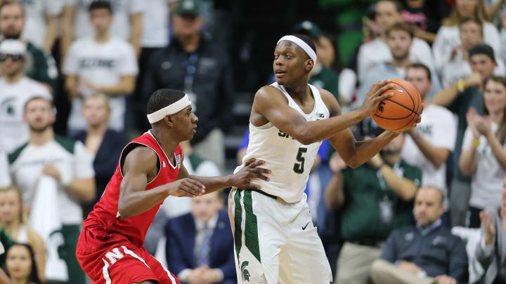 EAST LANSING, MI – DECEMBER 3: Cassius Winston #5 of the Michigan State Spartans handles the ball against Glynn Watson Jr. #5 of the Nebraska Cornhuskers at Breslin Center on December 3, 2017 in East Lansing, Michigan. (Photo by Rey Del Rio/Getty Images)