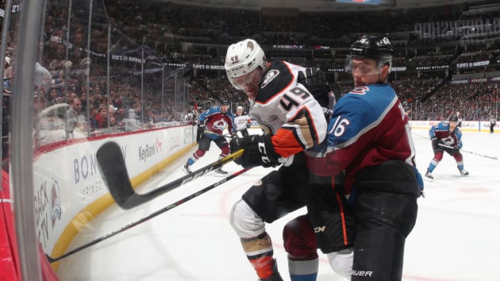 DENVER, COLORADO - OCTOBER 26: Nikita Zadorov #16 of the Colorado Avalanche battles for position against Max Jones #49 of the Anaheim Ducks at Pepsi Center on October 26, 2019 in Denver, Colorado. (Photo by Michael Martin/NHLI via Getty Images)