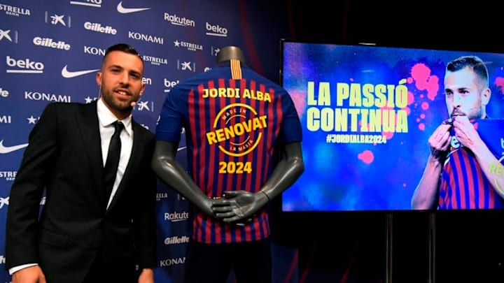 FC Barcelona's Spanish defender Jordi Alba poses during a press conference to officially announce his contract renewal at the Camp Nou stadium in Barcelona on March 11, 2019 (Photo by LLUIS GENE / AFP) (Photo credit should read LLUIS GENE/AFP/Getty Images)