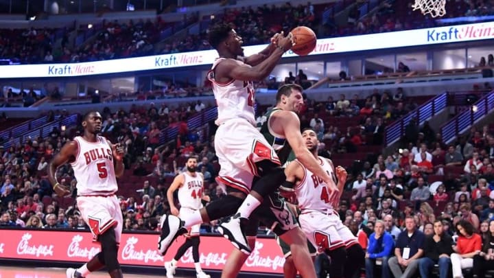 Oct 3, 2016; Chicago, IL, USA; Chicago Bulls guard Jimmy Butler (21) shoots the ball against the Milwaukee Bucks during the first half at the United Center. Mandatory Credit: Mike DiNovo-USA TODAY Sports