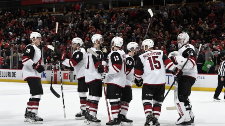 CHICAGO, IL - DECEMBER 08: The Arizona Coyotes celebrate after defeating the Chicago Blackhawks 4-3 at the United Center on December 8, 2019 in Chicago, Illinois. (Photo by Bill Smith/NHLI via Getty Images)