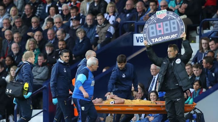 WEST BROMWICH, ENGLAND - OCTOBER 15: Mauricio Pochettino, Manager of Tottenham Hotspur pats Toby Alderweireld of Tottenham Hotspur on the chest after he is subbed off injured during the Premier League match between West Bromwich Albion and Tottenham Hotspur at The Hawthorns on October 15, 2016 in West Bromwich, England. (Photo by Richard Heathcote/Getty Images)