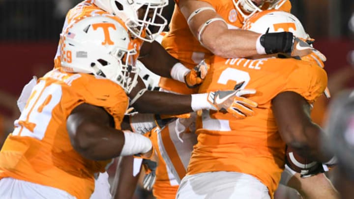 BRISTOL, TN – SEPTEMBER 10: Teammates surround defensive lineman Shy Tuttle #2 of the Tennessee Volunteers after he recovered a fumble against the Virginia Tech Hokies in the second half at Bristol Motor Speedway on September 10, 2016, in Bristol, Tennessee. Tennessee defeated Virginia Tech 45-24. (Photo by Michael Shroyer/Getty Images)