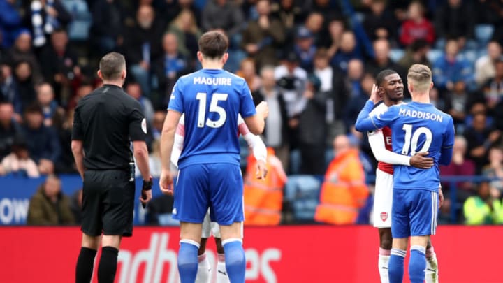 LEICESTER, ENGLAND - APRIL 28: Ainsley Maitland-Niles of Arsenal (2R) in discussion with James Maddison of Leicester City as he is sent off during the Premier League match between Leicester City and Arsenal FC at The King Power Stadium on April 28, 2019 in Leicester, United Kingdom. (Photo by Marc Atkins/Getty Images)