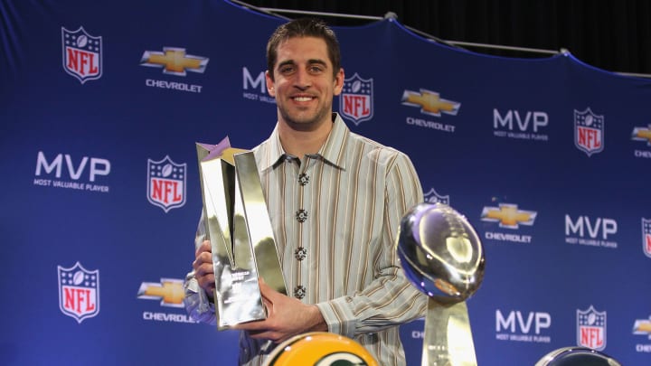 DALLAS, TX – FEBRUARY 07: Green Bay Packers quarterback Aaron Rodgers poses with the MVP trophy after speaking to the media during a press conference at Super Bowl XLV Media Center on February 7, 2011 in Dallas, Texas. (Photo by Streeter Lecka/Getty Images)