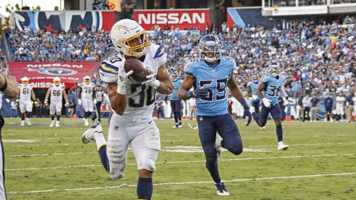 NASHVILLE, TENNESSEE – OCTOBER 20: Austin Ekeler #30 of the Los Angeles Chargers makes a touchdown reception against the Tennessee Titans during the second half at Nissan Stadium on October 20, 2019 in Nashville, Tennessee. (Photo by Frederick Breedon/Getty Images)