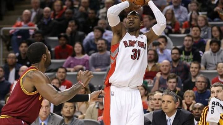 Feb 21, 2014; Toronto, Ontario, CAN; Toronto Raptors guard Terrence Ross (31) shoots the ball against the Cleveland Cavaliers at Air Canada Centre. The Raptors won 98-91. Mandatory Credit: Tom Szczerbowski-USA TODAY Sports