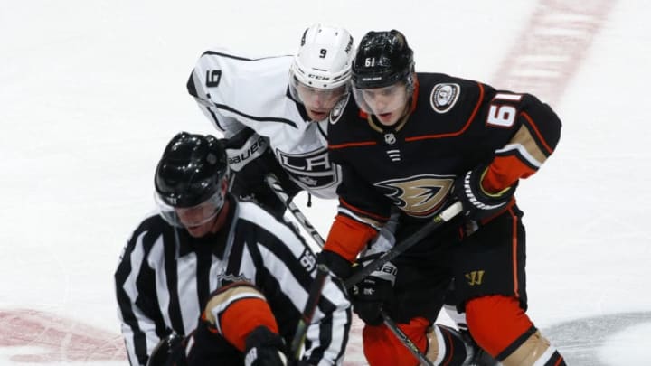 ANAHEIM, CA - DECEMBER 2: Adrian Kempe #9 of the Los Angeles Kings battles against Troy Terry #61 of the Anaheim Ducks during the game at Honda Center on December 2, 2019 in Anaheim, California. (Photo by Debora Robinson/NHLI via Getty Images)