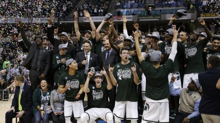 Mar 13, 2016; Indianapolis, IN, USA; Michigan State Spartans celebrate winning the Big Ten Championship against the Purdue Boilermakers during the Big Ten conference tournament at Bankers Life Fieldhouse. Michigan State defeats Purdue 66-62. Mandatory Credit: Brian Spurlock-USA TODAY Sports