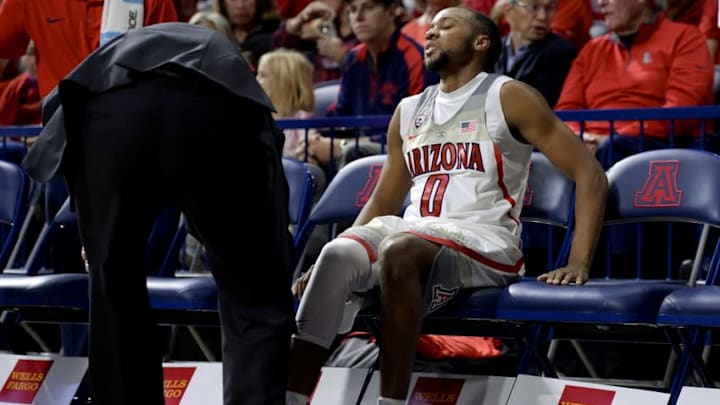 Nov 30, 2016; Tucson, AZ, USA; Arizona Wildcats guard Parker Jackson-Cartwright (0) sits on the bench after limping off of the court during the first half against the Texas Southern Tigers at McKale Center. Mandatory Credit: Casey Sapio-USA TODAY Sports