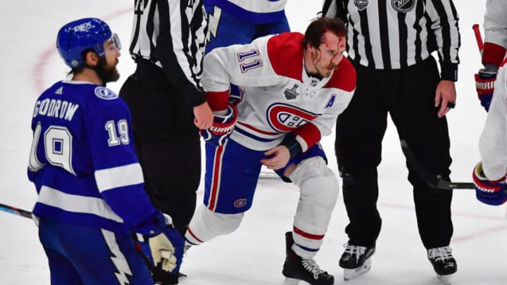 TAMPA, FLORIDA - JUNE 28: Brendan Gallagher #11 of the Montreal Canadiens sustains an injury against the Tampa Bay Lightning during the third period in Game One of the 2021 NHL Stanley Cup Final at Amalie Arena on June 28, 2021 in Tampa, Florida. (Photo by Julio Aguilar/Getty Images)