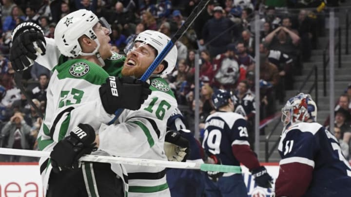 DENVER, CO - JANUARY 14: Joe Pavelski (16) of the Dallas Stars celebrates with teammate Esa Lindell (23) after Lindell scored an overtime winning goal against Philipp Grubauer (31) of the Colorado Avalanche at the Pepsi Center January 14, 2020. (Photo by Andy Cross/MediaNews Group/The Denver Post via Getty Images)