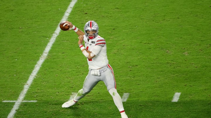 MIAMI GARDENS, FL – JANUARY 11: Justin Fields #1 of the Ohio State Buckeyes drops back to pass against the Alabama Crimson Tide during the College Football Playoff National Championship held at Hard Rock Stadium on January 11, 2021 in Miami Gardens, Florida. (Photo by Jamie Schwaberow/Getty Images)