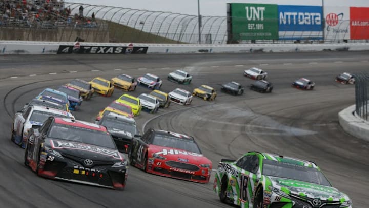 FORT WORTH, TX - APRIL 08: Kyle Busch, driver of the #18 Interstate Batteries Toyota, leads a pack of cars during the Monster Energy NASCAR Cup Series O'Reilly Auto Parts 500 at Texas Motor Speedway on April 8, 2018 in Fort Worth, Texas. (Photo by Sean Gardner/Getty Images)