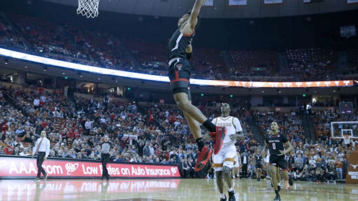 AUSTIN, TEXAS - FEBRUARY 08: Terrence Shannon Jr. #1 of the Texas Tech Red Raiders slam dunks in front of Andrew Jones #1 of the Texas Longhorns at The Frank Erwin Center on February 08, 2020 in Austin, Texas. (Photo by Chris Covatta/Getty Images)