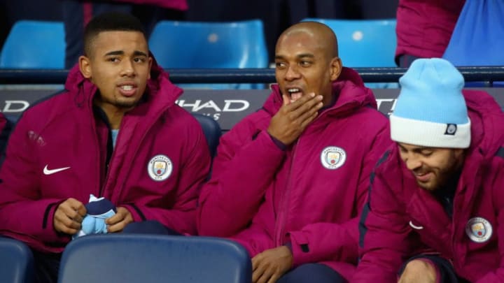 MANCHESTER, ENGLAND - DECEMBER 03: Gabriel Jesus of Manchester City (L), Fernandinho of Manchester City and Bernardo Silva of Manchester City (R) on the bench during the Premier League match between Manchester City and West Ham United at Etihad Stadium on December 3, 2017 in Manchester, England. (Photo by Clive Brunskill/Getty Images)