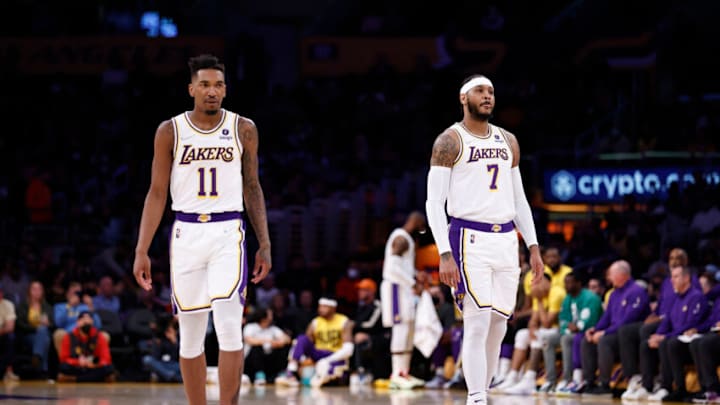LOS ANGELES, CALIFORNIA - FEBRUARY 27: Malik Monk #11 of the Los Angeles Lakers and Carmelo Anthony #7 of the Los Angeles Lakers look on against the New Orleans Pelicans during the first half at Crypto.com Arena on February 27, 2022 in Los Angeles, California. The New Orleans Pelicans won 123-95. (Photo by Michael Owens/Getty Images)