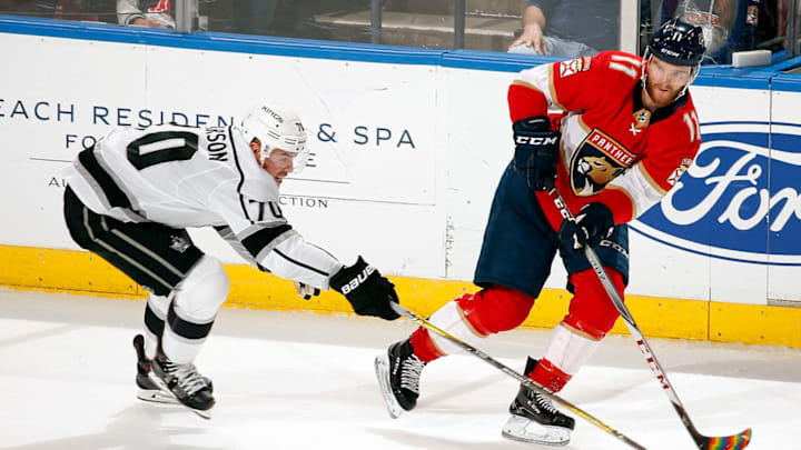 SUNRISE, FL – FEBRUARY 9: Jonathan Huberdeau #11 of the Florida Panthers passes the puck against Tanner Pearson #70 of the Los Angeles Kings at the BB&T Center on February 9, 2018 in Sunrise, Florida. (Photo by Eliot J. Schechter/NHLI via Getty Images)