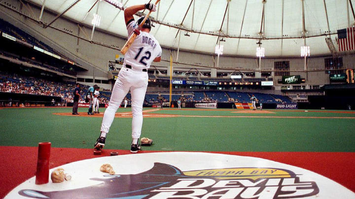 Tampa Bay Devil Rays third baseman Wade Boggs warms up 29 March before going to bat during the fourth inning of the Devil Rays last exhibition game before the start of their first season at the new Tropicana field in St.Petersburg, Florida. AFP PHOTO/Peter MUHLY (Photo by PETER MUHLY / AFP) (Photo credit should read PETER MUHLY/AFP via Getty Images)