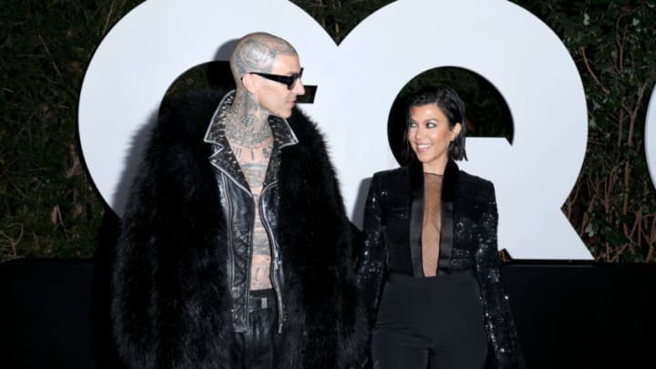 WEST HOLLYWOOD, CALIFORNIA - NOVEMBER 17: Travis Barker and Kourtney Kardashian Barker attend the GQ Men of the Year Party 2022 at The West Hollywood EDITION on November 17, 2022 in West Hollywood, California. (Photo by Phillip Faraone/Getty Images for GQ)