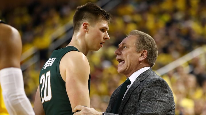 ANN ARBOR, MICHIGAN – FEBRUARY 24: Head coach Tom Izzo of the Michigan State Spartans talks to Matt McQuaid #20 while playing the Michigan Wolverines at Crisler Arena on February 24, 2019 in Ann Arbor, Michigan. Michigan State won the game 77-70. (Photo by Gregory Shamus/Getty Images)