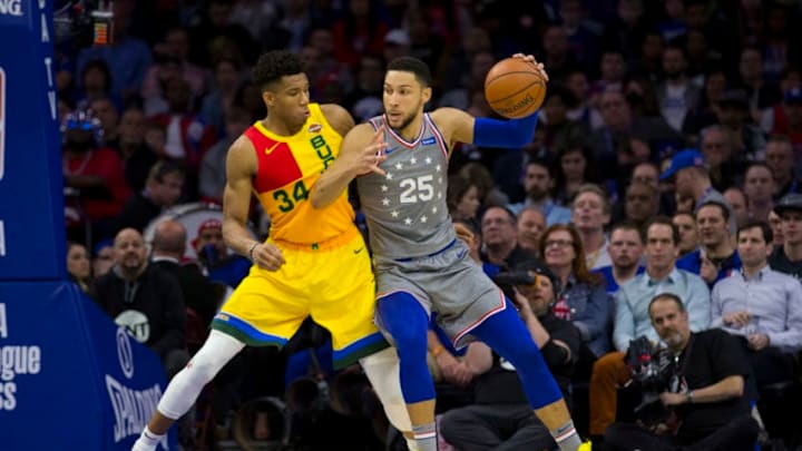 Philadelphia 76ers Ben Simmons Milwaukee Bucks Giannis Antetokounmpo. Photo by Mitchell Leff/Getty Images