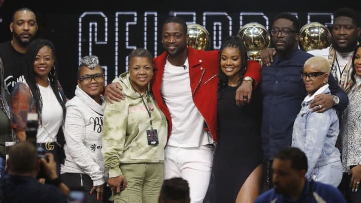 Former Miami Heat player Dwyane Wade poses for a photo with his wife, Gabrielle Union and famiuly after the Miami Heat Dwyane Wade L3GACY Celebration at American Airlines Arena (Photo by Michael Reaves/Getty Images)