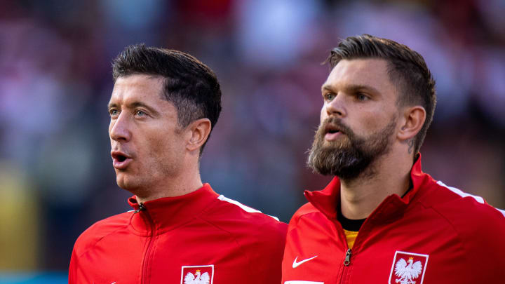 Robert Lewandowski and Bartlomiej Dragowski of Poland (Photo by Sebastian Frej/MB Media/Getty Images)