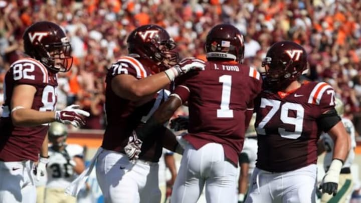 Aug 30, 2014; Blacksburg, VA, USA;The Virginia Tech Hokies celebrates with Virginia Tech Hokies wide receiver Isaiah Ford (1) after a touchdown during the first quarter against the William & Mary Tribe at Lane Stadium. Mandatory Credit: Peter Casey-USA TODAY Sports