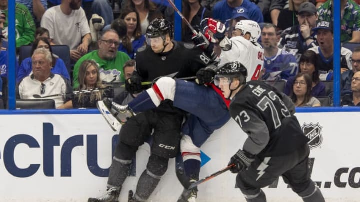 TAMPA, FL - MARCH 16: Tampa Bay Lightning defenseman Erik Cernak (81) checks Washington Capitals defenseman Dmitry Orlov (9) during the NHL Hockey match between the Lightning and Capitols on March 16, 2019 at Amalie Arena in Tampa, FL. (Photo by Andrew Bershaw/Icon Sportswire via Getty Images)