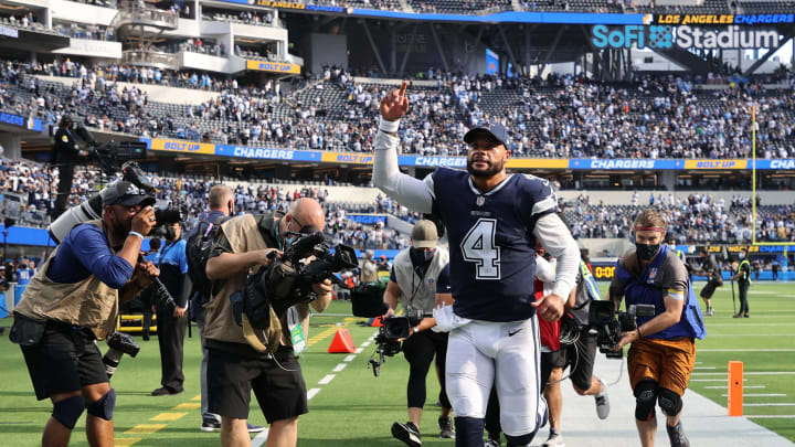 INGLEWOOD, CALIFORNIA – SEPTEMBER 19: Dak Prescott #4 of the Dallas Cowboys reacts as he leaves the filed after a 20-17 win over the Los Angeles Chargers at SoFi Stadium on September 19, 2021 in Inglewood, California. (Photo by Harry How/Getty Images)
