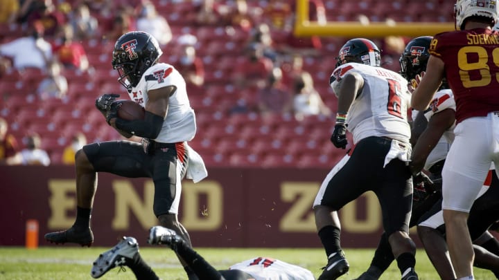 Oct 10, 2020; Ames, Iowa, USA; Texas Tech Red Raiders senior defensive back Zech McPhearson (8) recovers a fumble against the Iowa State Cyclones at Jack Trice Stadium. Mandatory Credit: Brian Powers-USA TODAY Sports.