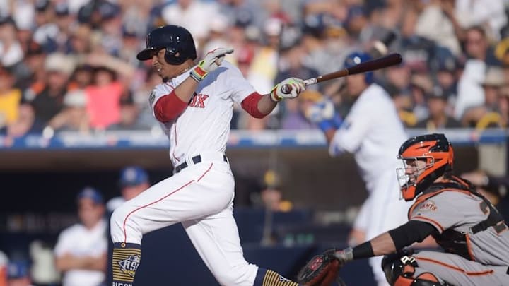 Jul 12, 2016; San Diego, CA, USA; American League outfielder Mookie Betts (50) of the Boston Red Sox gets a base hit in the second inning in the 2016 MLB All Star Game at Petco Park. Mandatory Credit: Gary A. Vasquez-USA TODAY Sports