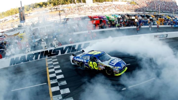 MARTINSVILLE, VA - OCTOBER 21: Jimmie Johnson, driver of the #48 Lowe's Chevrolet, does a victory burnout after winning the NASCAR Nextel Cup Series Subway 500 at Martinsville Speedway on October 21, 2007 in Martinsville, Virginia. (Photo by Chris Graythen/Getty Images)