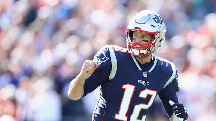 FOXBOROUGH, MA - SEPTEMBER 30: Tom Brady #12 of the New England Patriots celebrates after throwing a touchdown pass to Cordarrelle Patterson #84 (not pictured) during the second quarter against the Miami Dolphins at Gillette Stadium on September 30, 2018 in Foxborough, Massachusetts. (Photo by Maddie Meyer/Getty Images)
