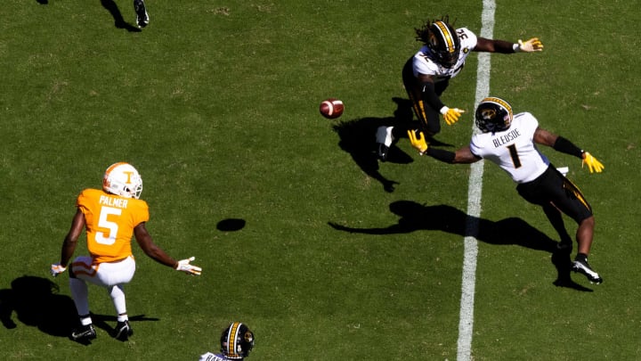 Missouri linebacker Nick Bolton (32) and Missouri safety Joshuah Bledsoe (1) break up a pass intended for Tennessee wide receiver Josh Palmer (5) during a SEC conference football game between the Tennessee Volunteers and the Missouri Tigers held at Neyland Stadium in Knoxville, Tenn., on Saturday, October 3, 2020.Kns Ut Football Missouri Bp