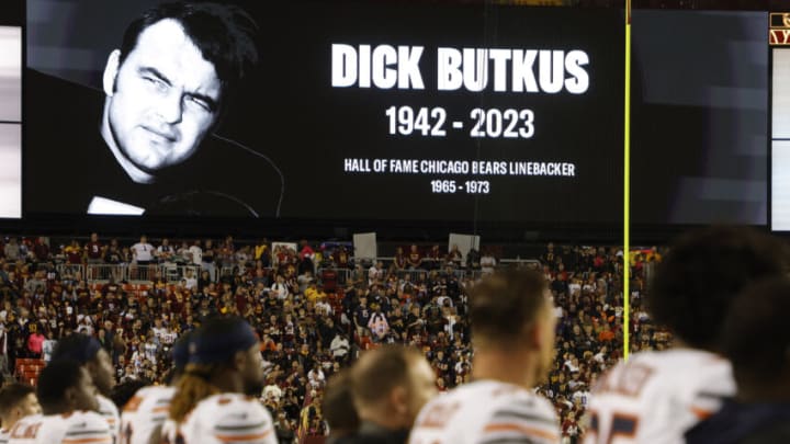 Oct 5, 2023; Landover, Maryland, USA; Chicago Bears players stand on the sidelines as a moment of silence is observed to mourn the passing of football hall of fame member and Bears linebacker Dick Butkus prior to the game against the Washington Commanders at FedExField. Mandatory Credit: Geoff Burke-USA TODAY Sports