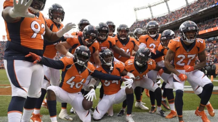 DENVER, CO – DECEMBER 30: The Denver Broncos celebrate an interception by Isaac Yiadom (41) of the Denver Broncos during the first quarter. The Denver Broncos hosted the Los Angeles Chargers at Broncos Stadium at Mile High in Denver, Colorado on Sunday, December 30, 2018. (Photo by Joe Amon/The Denver Post via Getty Images)
