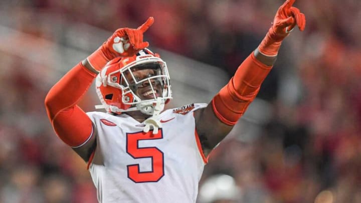 Clemson defensive end K.J. Henry celebrates sacking Iowa State quarterback Brock Purdy during last week's Cheez-It Bowl in Orlando, Fla.Ncaa Football Cheez It Bowl Iowa State Vs Clemson