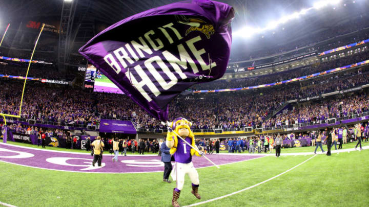 MINNEAPOLIS, MN - JANUARY 14: Minnesota Vikings mascot Viktor waves a flag reading 'Bring it home' after the Minnesota Vikings defeated the New Orleans Saints in the NFC Divisional Playoff game on January 14, 2018 at U.S. Bank Stadium in Minneapolis, Minnesota. (Photo by Adam Bettcher/Getty Images)