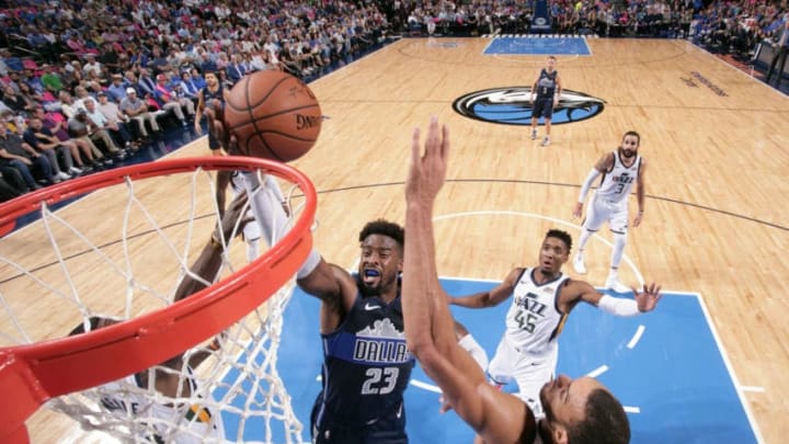 DALLAS, TX - OCTOBER 28: Wesley Matthews #23 of the Dallas Mavericks shoots the ball against the Utah Jazz during a game on October 28, 2018 at American Airlines Center in Dallas, Texas. NOTE TO USER: User expressly acknowledges and agrees that, by downloading and/or using this Photograph, user is consenting to the terms and conditions of the Getty Images License Agreement. Mandatory Copyright Notice: Copyright 2018 NBAE (Photo by Glenn James/NBAE via Getty Images)