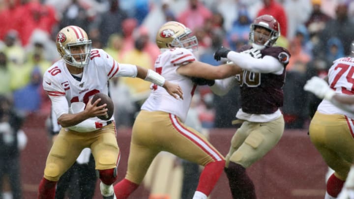 LANDOVER, MARYLAND - OCTOBER 20: Jimmy Garoppolo #10 of the San Francisco 49ers scrambles against the Washington Redskins at FedExField on October 20, 2019 in Landover, Maryland. (Photo by Rob Carr/Getty Images)