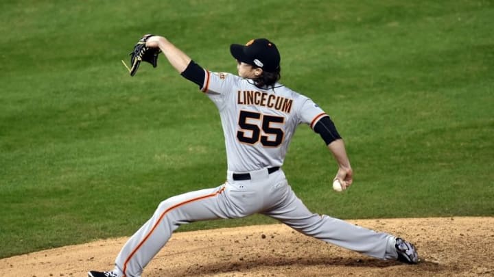 Oct 22, 2014; Kansas City, MO, USA; San Francisco Giants pitcher Tim Lincecum (55) throws a pitch against the Kansas City Royals in the 7th inning during game two of the 2014 World Series at Kauffman Stadium. Mandatory Credit: Peter G. Aiken-USA TODAY Sports