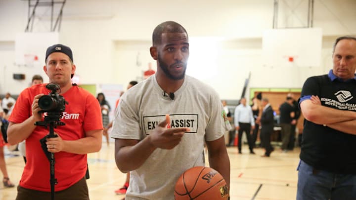 NEW YORK, NY - JUNE 21: NBA All-Star Chris Paul holds a basketball clinic at Educational Alliance Boys