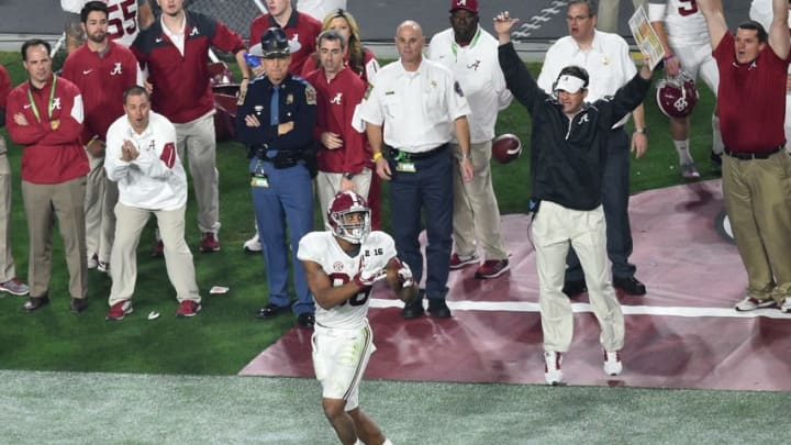 Jan 11, 2016; Glendale, AZ, USA; Alabama Crimson Tide tight end O.J. Howard (88) makes a catch for a touchdown as offensive coordinator Lane Kiffin reacts on the sideline during the third quarter against the Clemson Tigers in the 2016 CFP National Championship at University of Phoenix Stadium. Mandatory Credit: Gary A. Vasquez-USA TODAY Sports