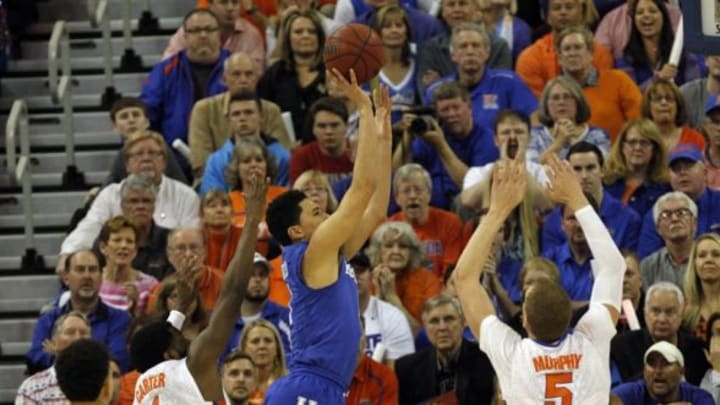 Feb 7, 2015; Gainesville, FL, USA; Kentucky Wildcats guard Devin Booker (1) shoots over Florida Gators forward Alex Murphy (5) during the first half at Stephen C. O’Connell Center. Mandatory Credit: Kim Klement-USA TODAY Sports