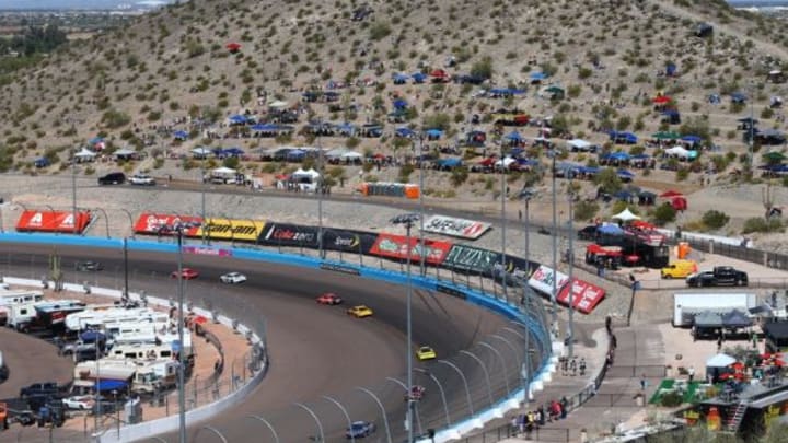 Mar 13, 2016; Avondale, AZ, USA; NASCAR Sprint Cup Series drivers race through turn three during the Good Sam 500 at Phoenix International Raceway. Mandatory Credit: Mark J. Rebilas-USA TODAY Sports